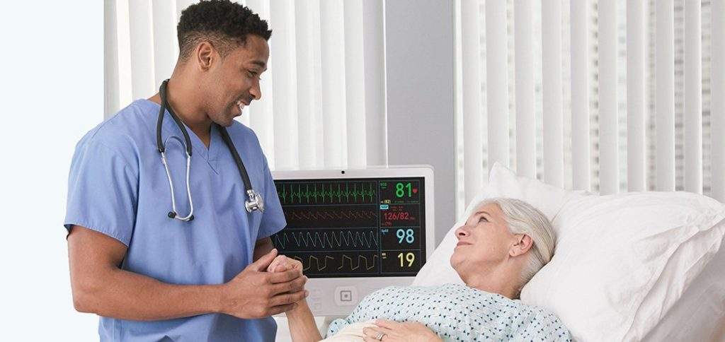 Certified Ekg Technician Helping Woman