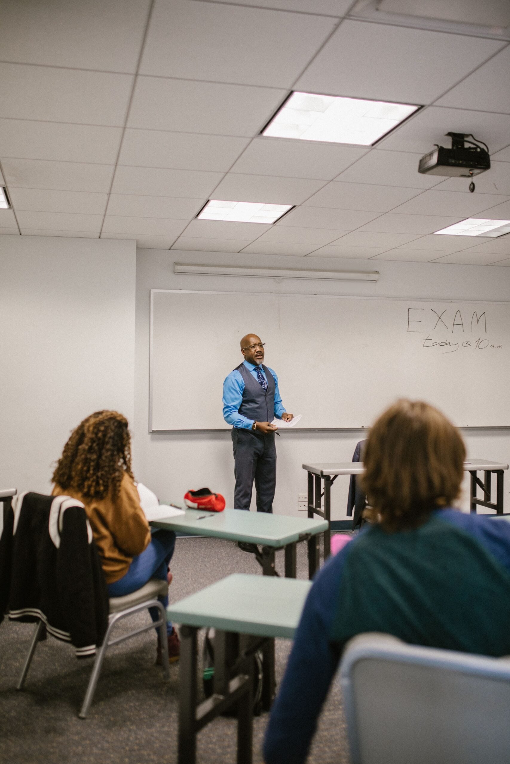 Instructor giving a presentation to adult learners
