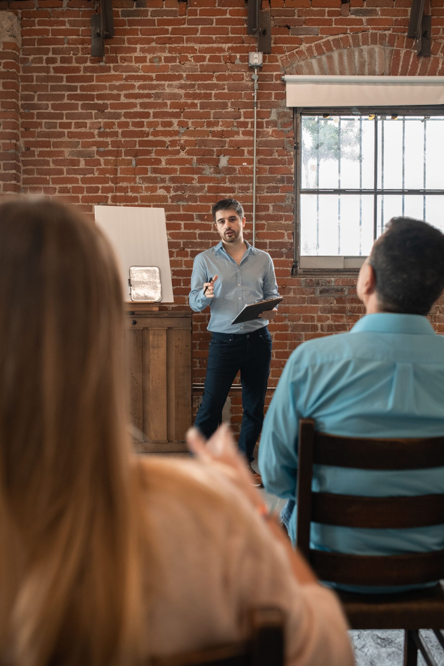 Professional instructor leading an adult education class