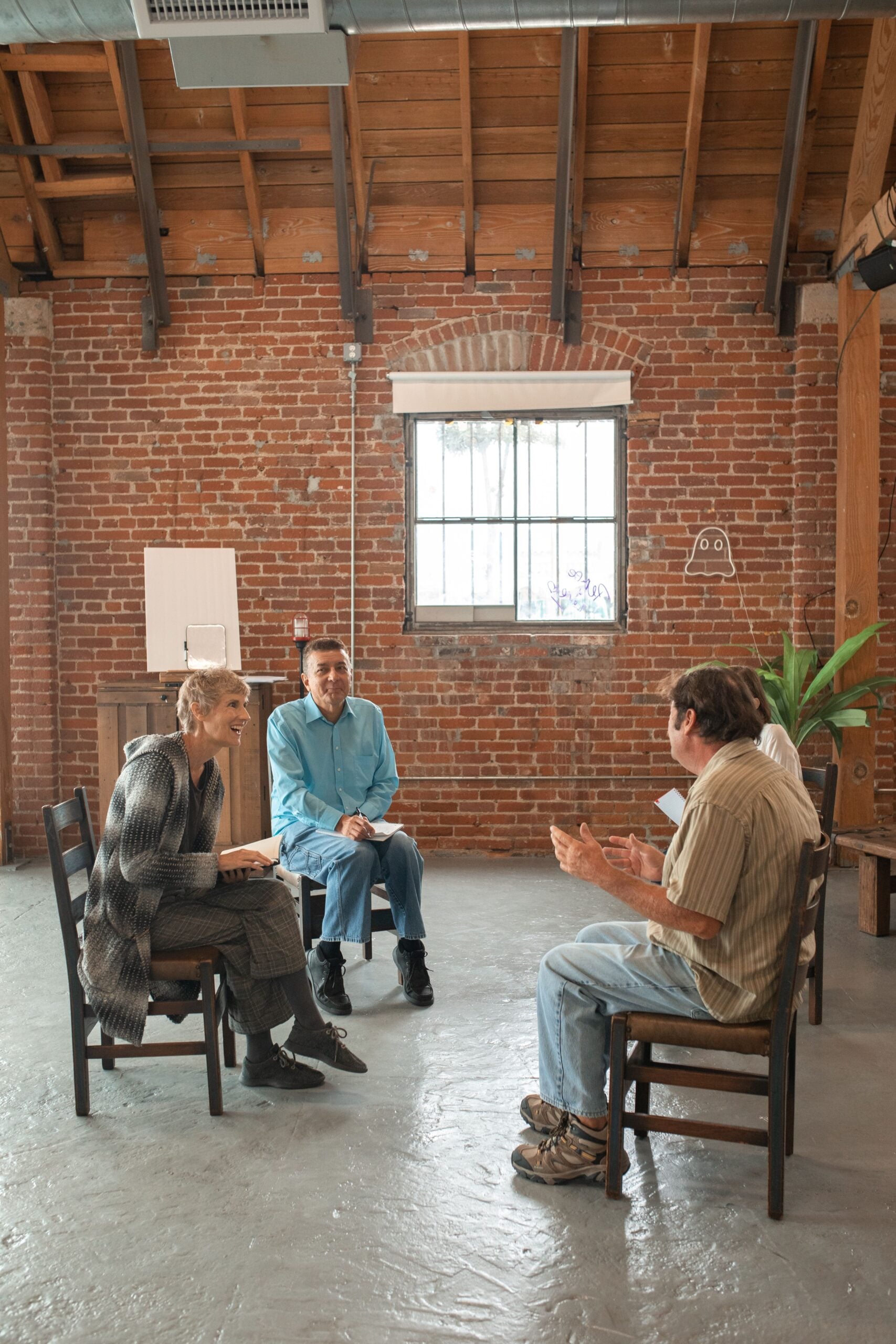 Adult learners participating in a facilitated group discussion