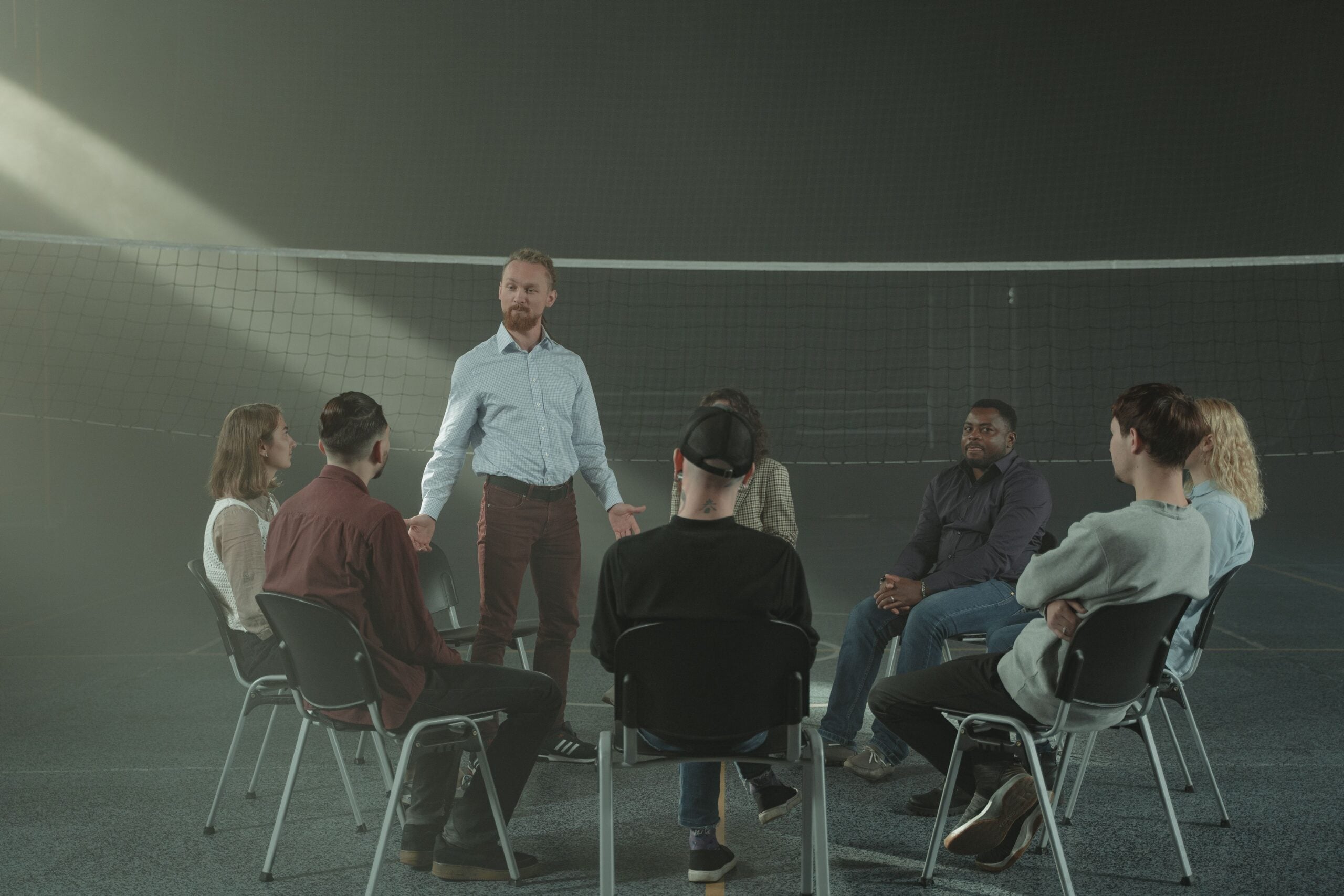 Facilitator leading a professional adult group discussion